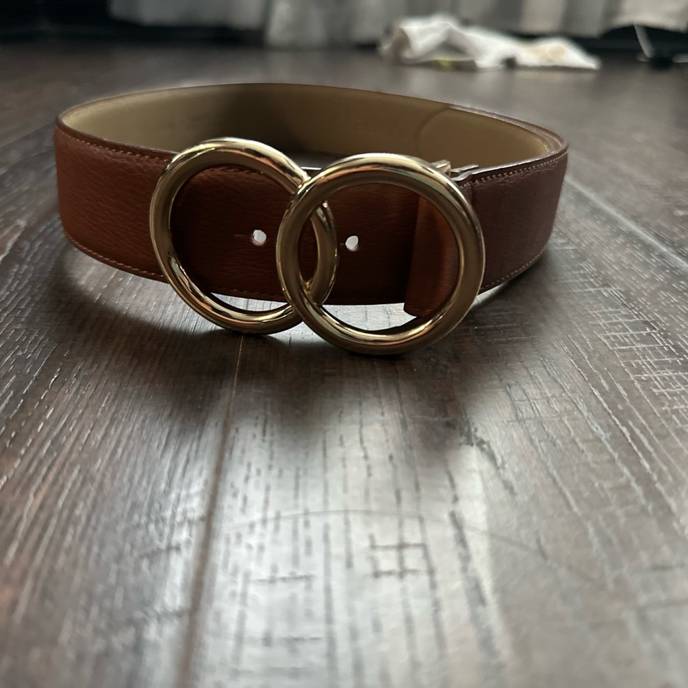 Express synthetic leather belt with gold colored clasp
